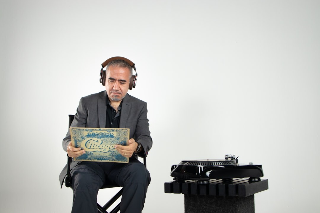 Studio portrait of a white man broadcast engineer with headset