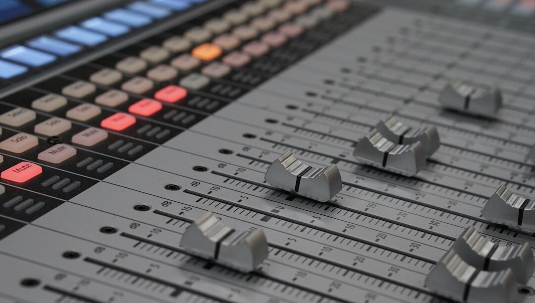 Vision mixer desk with multiple video preview monitors in a television gallery